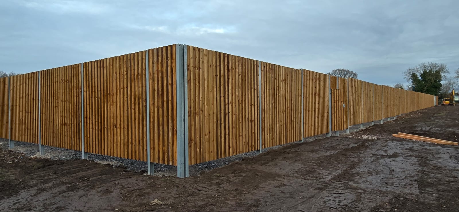 Acoustic fence panels installation - noise barrier systems commercial sites UK